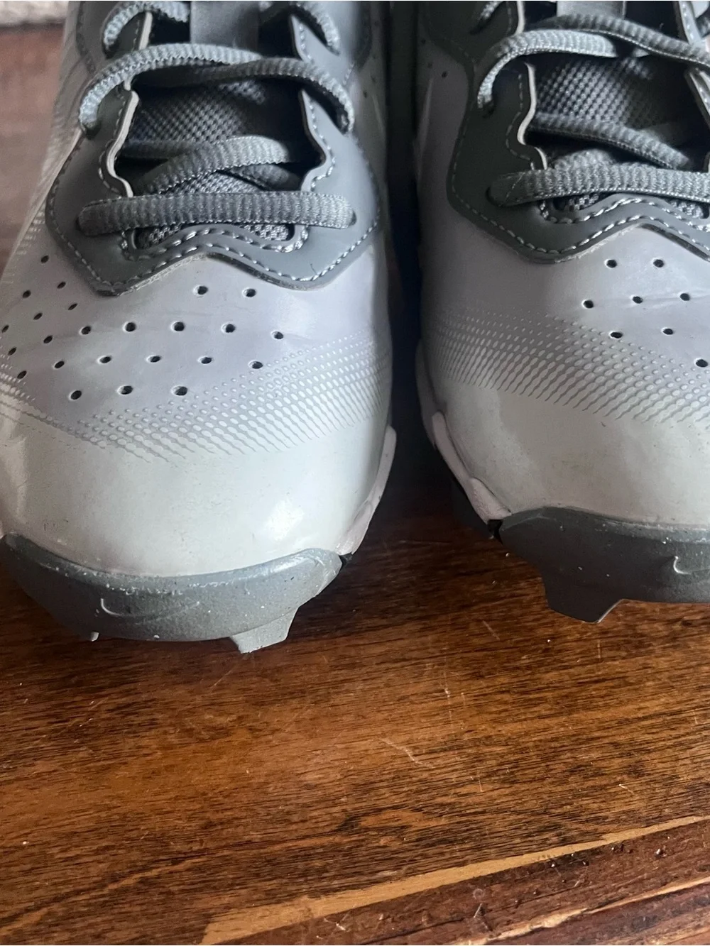 Nike Gray Youth Cleats with White Swoosh